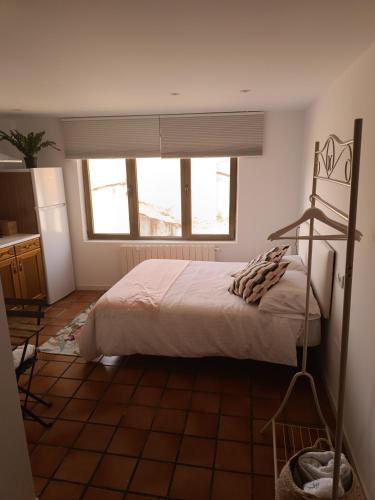 Ένα ή περισσότερα κρεβάτια σε δωμάτιο στο Casa de la tía 2