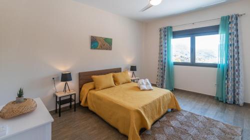 Katil atau katil-katil dalam bilik di Villa Las Viñas Arenas by Ruralidays