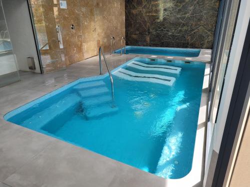 Townhouse with jacuzzi, sauna, beach and barbeque