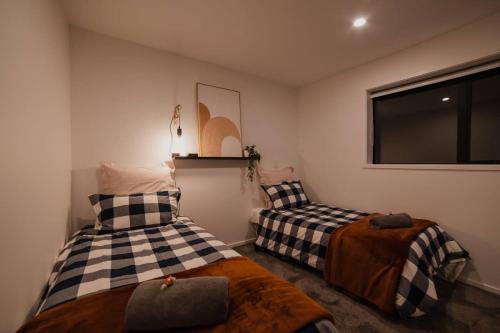 Кровать или кровати в номере The Perfect City Nook - Designers Delight