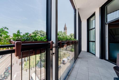 a balcony with a view of the city at Hotel Milano Navigli in Milan