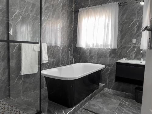 Koupelna v ubytování Oakville Lodge