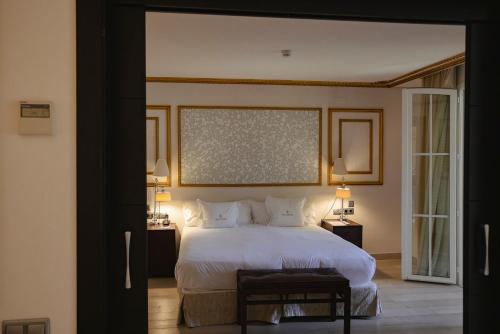 Кровать или кровати в номере Las Dunas Grand Luxury