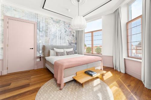 Postel nebo postele na pokoji v ubytování Eclectic Hotel Copper