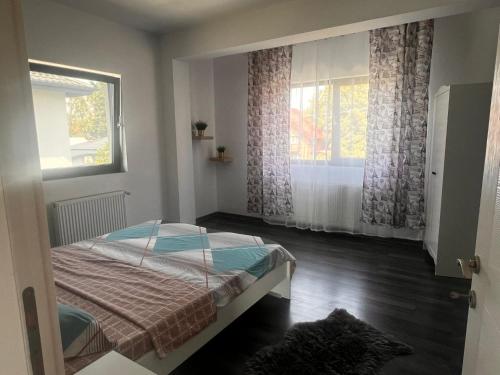 Ένα ή περισσότερα κρεβάτια σε δωμάτιο στο DD Residence