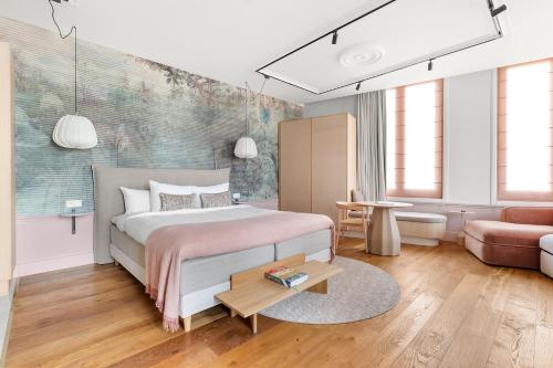 Postel nebo postele na pokoji v ubytování Eclectic Hotel Copper