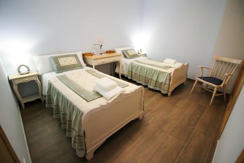 Postel nebo postele na pokoji v ubytování Lar de Carmen Arcade