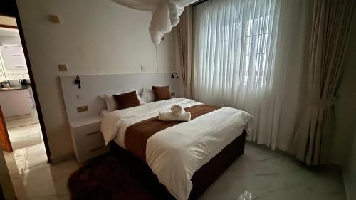 Postel nebo postele na pokoji v ubytování Classic residence juja