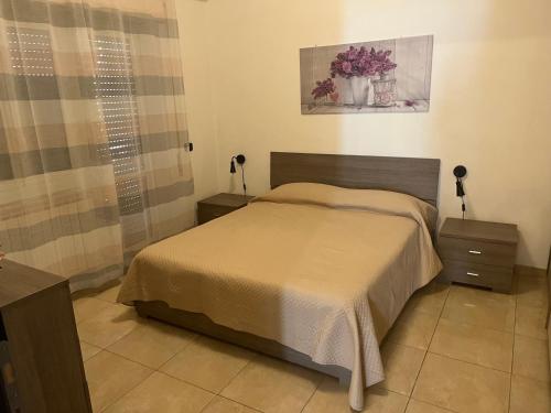 Ένα ή περισσότερα κρεβάτια σε δωμάτιο στο Casa coveri