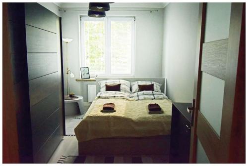 Postel nebo postele na pokoji v ubytování Color 24 Apartament Relaks