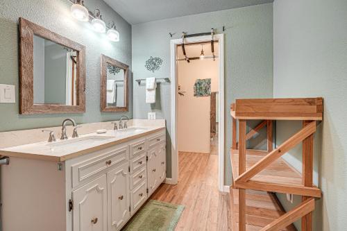 a bathroom with a sink and two mirrors and a ladder at Mtn-View Gem Deck, Grill and Fire Pit in West Point in Volcano