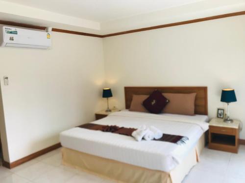 Postel nebo postele na pokoji v ubytování Global Hotel Beach View