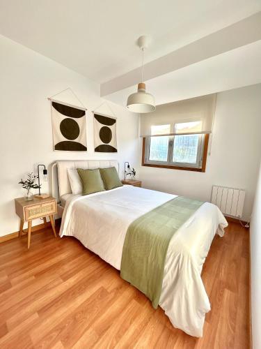 Ένα ή περισσότερα κρεβάτια σε δωμάτιο στο Apartamento Enseñanza - Kid Friendly