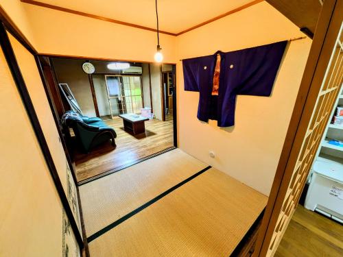 Postel nebo postele na pokoji v ubytování ゲストハウス 汀 Guesthouse NAGISA