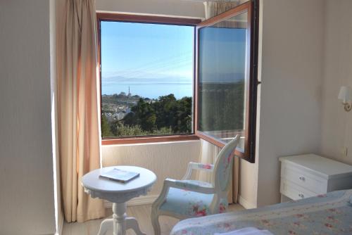 Un lugar para sentarse en Aeneas Hotel