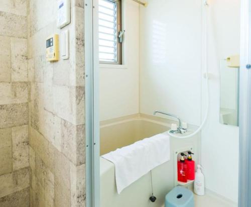 Koupelna v ubytování F HOUSE Os Residence S4
