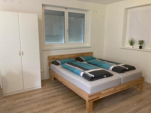 a bedroom with a bed in a room at Ferienwohnung Kreuzstube in Vandans