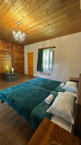 Postel nebo postele na pokoji v ubytování guest house zizi
