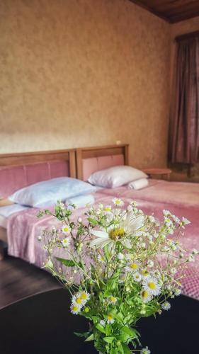 Postel nebo postele na pokoji v ubytování guest house zizi