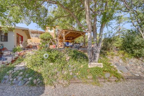 a house with a sign in front of it at Vineyard Views and Sauna at Cornville Home! in Cottonwood