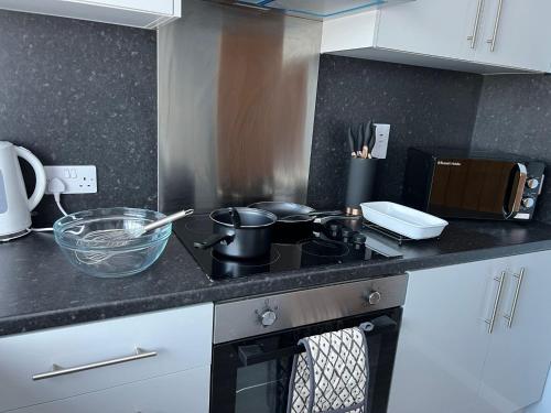 Kuchyň nebo kuchyňský kout v ubytování Oakfield Apartment