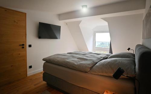 Postel nebo postele na pokoji v ubytování May Chalet