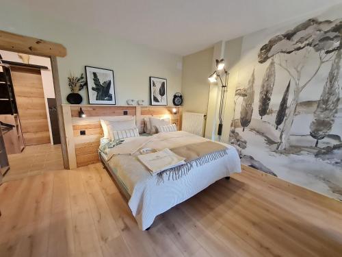 Katil atau katil-katil dalam bilik di Charmante chambre avec salle d'eau privative et espace salon - FR-1-584-325