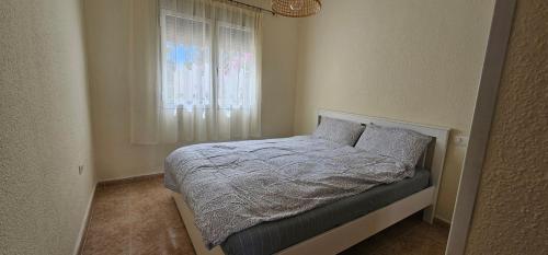 Una cama o camas en una habitación de Paris beach apartman