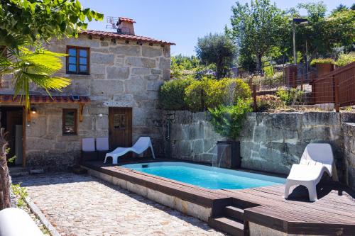 Πισίνα στο ή κοντά στο Casa da Aldeia “Póvoa Dão”