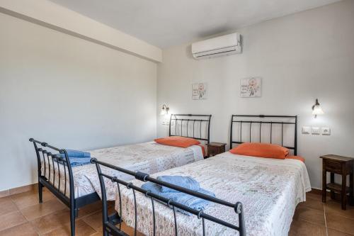 Katil atau katil-katil dalam bilik di Casa Nuova