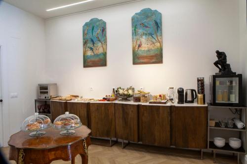a room with a counter with food on it at Pries Homes - Center Beach in Málaga