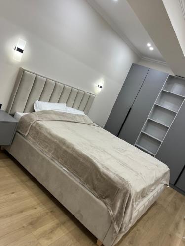 Llit o llits en una habitació de Park Apartment
