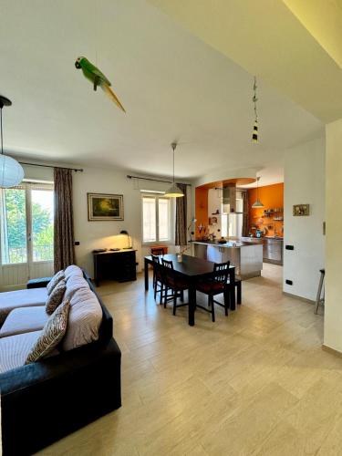 a large living room with a parrot on the ceiling at Appartamento La Valle in Passignano sul Trasimeno