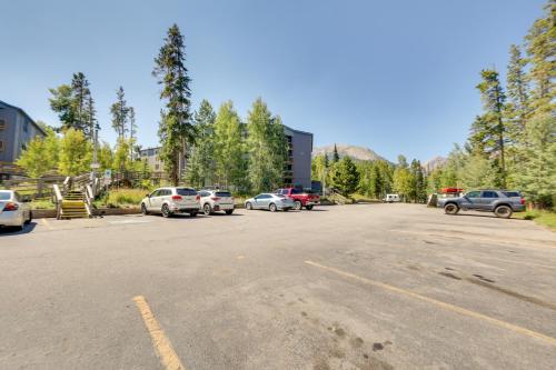 a parking lot with several cars parked in it at Mtn-View Condo with Community Perks in Silverthorne in Silverthorne