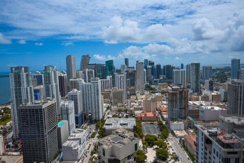 an aerial view of a city with tall buildings at Miami Luxe Escape Best High Waterfront Views, City Lights, Pool, Spa Amazing location in Miami