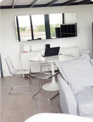 Loft climatisé vue fleuve parking gratuit