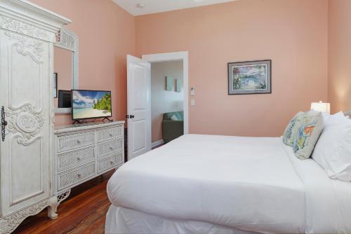 Ένα ή περισσότερα κρεβάτια σε δωμάτιο στο Havana Inn