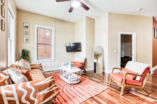 a living room with a couch and chairs at Near Starland & River St - Private Patio & BBQ - Parking in Savannah