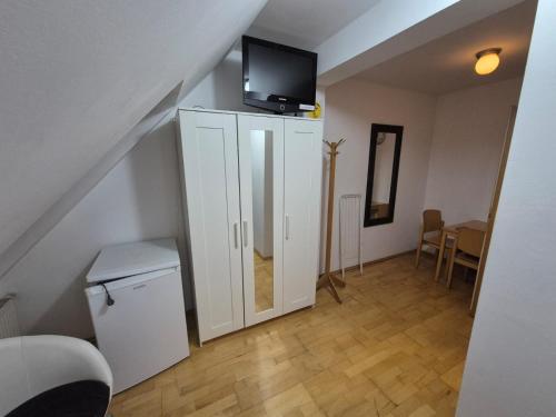 TV a/nebo společenská místnost v ubytování Vienna Rooms Nr 15
