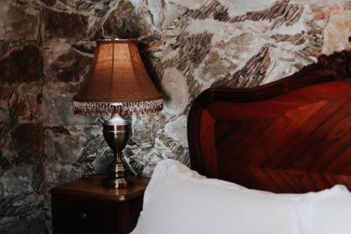 Hotel Boutique Mesón de la Abundanciaにあるベッド
