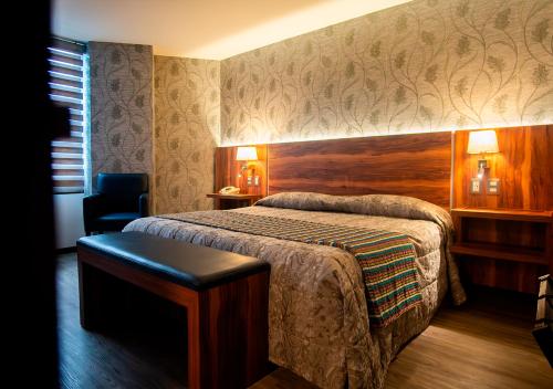 Postel nebo postele na pokoji v ubytování Hotel Parque Satelite