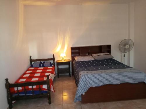 En eller flere senge i et værelse på DEPTOSVM Complejo