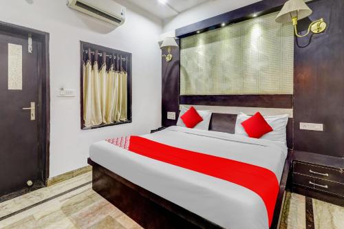 En eller flere senge i et værelse på Super Hotel O Vintage House