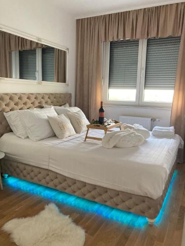 Postel nebo postele na pokoji v ubytování Apartman 10 Lux