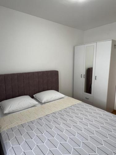 Postel nebo postele na pokoji v ubytování Apartman 306