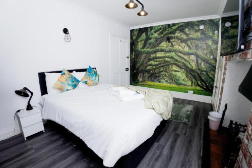 Una cama o camas en una habitación de Church Street House