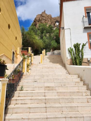 a set of stairs leading up to a mountain at Mediterranean Loft in Alicante