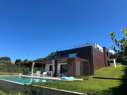Chalet en la playa con vistas