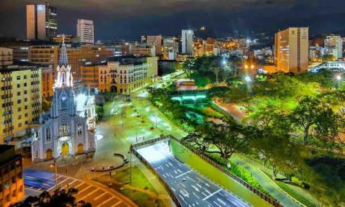 a view of a city at night with at Hotel Orduz Centro Histórico de Cali in Cali