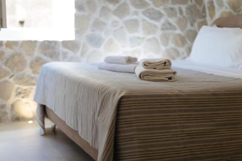 Ein Bett oder Betten in einem Zimmer der Unterkunft A ca' in ta Stacca